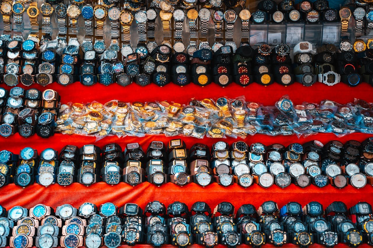 Home - Offiicial Colorful wristwatch display at a vibrant street market in Colombo, Sri Lanka.